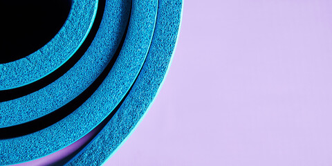 Banner with blue colored yoga mat for exercise and fitness