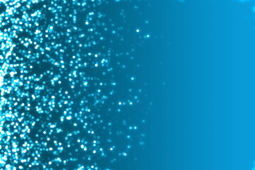 Ocean blue white glitter particles left side with abstract blurred light as decoration and background