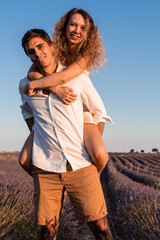 Romantic couple posing in a lavender field