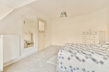 a bedroom with a bed, dressers and mirror on the wall in this room is very light white color