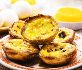 Pastel de nata, called Pastel de Belem, traditional Portuguese crunchy and sour sweet made with eggs
