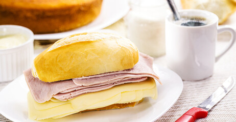 Brazilian breakfast, french salt bread with mozzarella cheese and ham, tradition on brazil