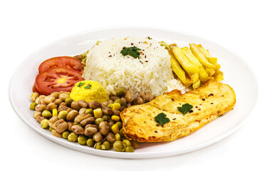 typical Brazilian meal, rice and beans, farofa, fries, tomato and salad with fried chicken fillet, called 