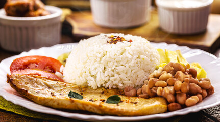 rice and beans typical of brazil, healthy and light food, grilled chicken and salad, brazilian restaurant food