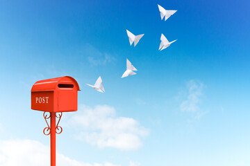 Red Post Boxes and Flying Paper Butterfly.