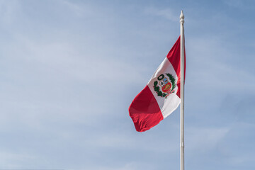 Peruvian flag flying in the sky