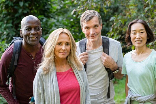 Diverse Group Of Middle-aged Friends Having A Good Time Outdoors