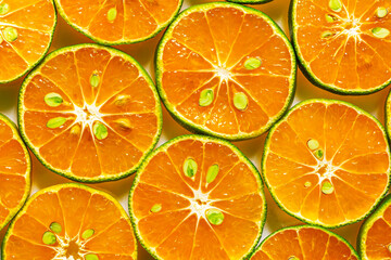 Macro orange,Heap of fresh orange slices background. Healthy nutrition with vitamin c. Close up view. 