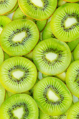 macro kiwi,Top view of sliced kiwi with water splashes. Fresh juicy food and drink background.