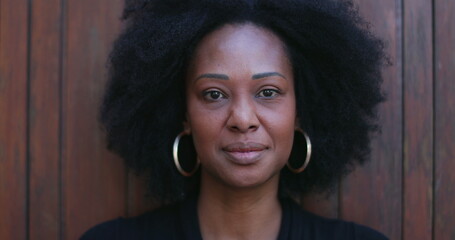 African woman portrait looking at camera. Black person close-up face