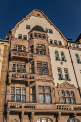 Obraz premium Beautiful traditional medieval buildings along the picturesque river Rhine promenade at sunset. DUSSELDORF, GERMANY.