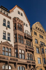 Beautiful traditional medieval buildings along the picturesque river Rhine promenade at sunset. DUSSELDORF, GERMANY.