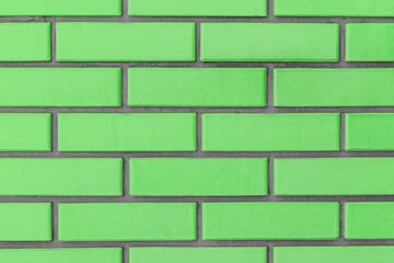 Light green verdant salad color brick blocks wall texture background brickwork