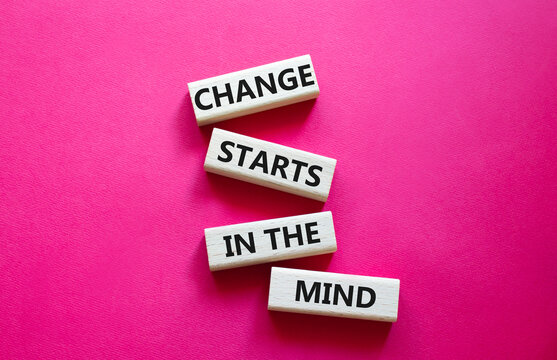 Change starts in the mind symbol. Concept words Change starts in the mind on wooden blocks. Beautiful red background. Business and Change starts in the mind concept. Copy space