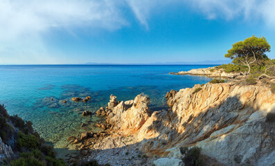 Aegean sea coast evening landscape with aquamarine water, view near Mega Portokali Beach (Sithonia, Chalkidiki, Greece).