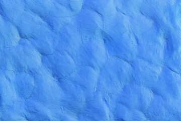 Blue paint on the stone surface wall texture abstract background