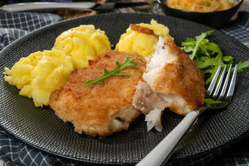 Fried cod fillet served.