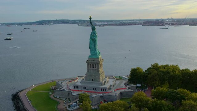 Aerial Orbit of Statue of Liberty in Liberty Island, New York City. United States. This Sculpture was designed by French sculptor Fr&eacute;d&eacute;ric Auguste Bartholdi. High Quality Footage Shot from Helicopter