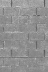 Grey paint on brick vertical blocks urban gray design wall texture background monochrome architecture