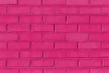 Crimson color pink paint on brick old wall texture background abstract pattern stone