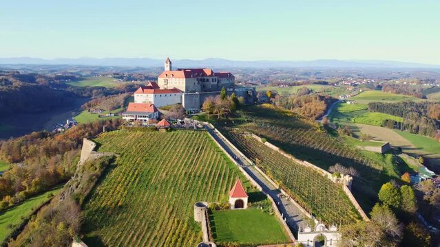 Flight around the idyllic castle Riegersburg in Styria, Austria on a beautiful autumn day	
