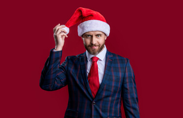 studio shot of cheerful christmas santa businessman. christmas businessman wear santa hat.