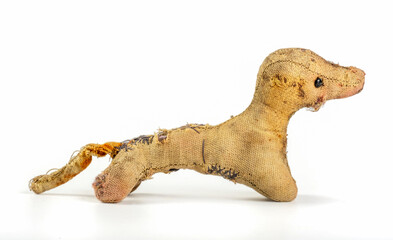 dog, very old broken toy
