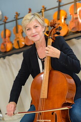 playing cello in the shop © auremar