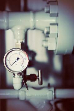 Close up of pressure gauge and components of instrumentation and controls in a fabrication plant; Innisfail, Alberta, Canada