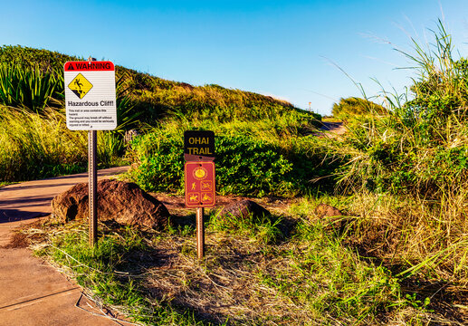Sign warning of hazardous cliffs on the Ohai Trail; Maui, Hawaii, United States of America