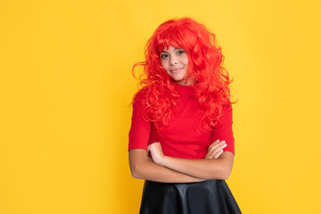 smiling teen kid with red long hair on yellow background