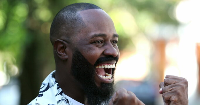 Black African Man Screaming With Joy, Overjoyed Excited Person