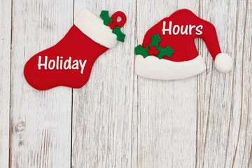 Holiday Hours message with Santa hat and Christmas stocking with space for your Christmas opening...
