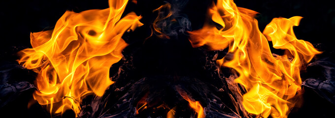 Fire blaze. Abstract blaze, fire on a black background, flame texture for banner, background and...