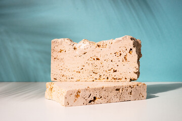 Stone podium for presentation cosmetic products.