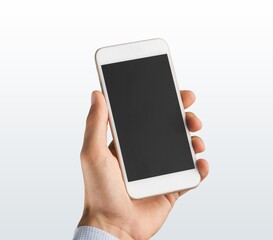 Hand hold a phone with a blank screen