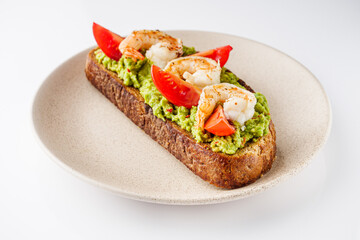 delicious Italian bruschetta with shrimps on a white background