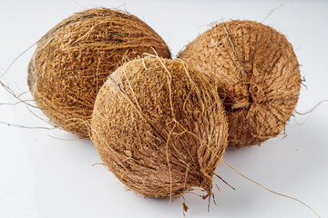 fresh natural coconut on white acrylic background