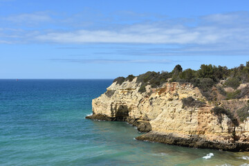 Fototapeta premium Scenic view of the cliffs near Armacao de Pera