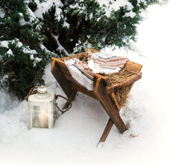 Manger with straw. Christmas background