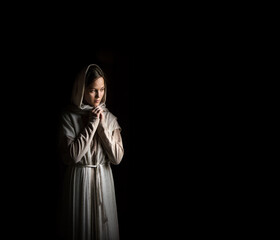 Young girl on dark background