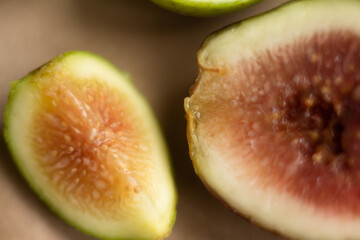 extreme close-up of fig halve and quarter with blurred background