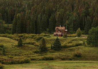 Lone cabin on a mountainside