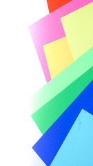 Colorful paper stack background. collection of rainbow color paper for social media post design.