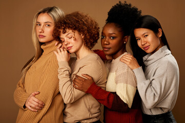 Studio shot of a multicultural beautiful girls with natural skin posing.