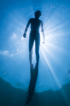 A freediver prepares to dive in China.