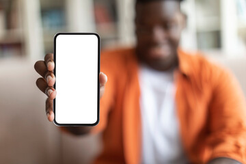 Phone with white empty screen in male hand