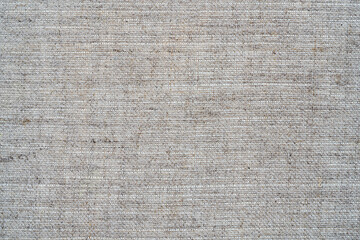 gray canvas texture with delicate mesh pattern as abstract background