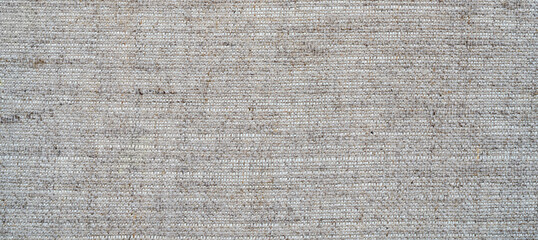 gray canvas texture with delicate mesh pattern as abstract background