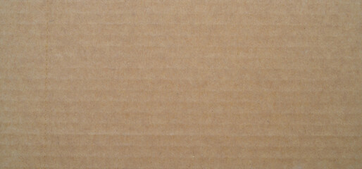 smooth brown cardboard paper, full frame, close up. background and texture of brown paper...